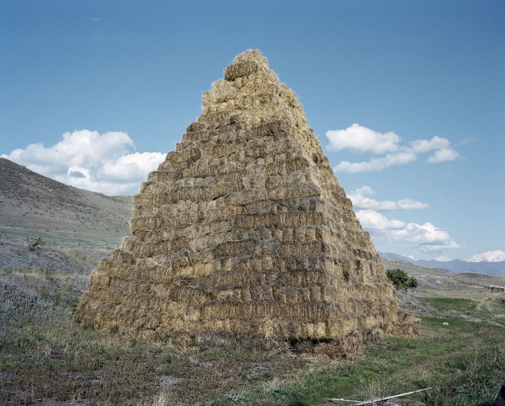 Spitak - Armenia. Hay collected for winter time and stored in over 1000 cubes. 4 JUL 2014. On December 7, 1988 a strong earthquake destroyed completely the town of Spitak. The damage in the region was so big that the Soviet authorities decided to ask for help also in the western countries. 25 years after the disaster the city, although rebuilt, still bears the marks of the tragedy